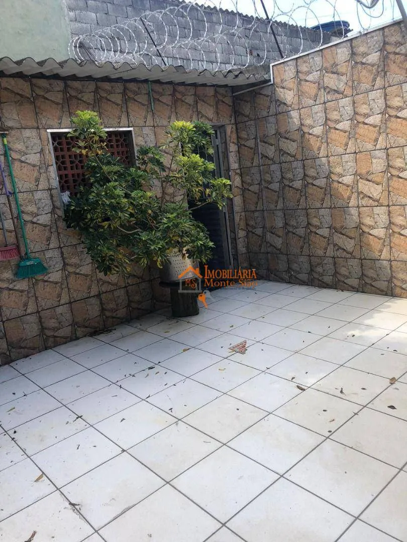 Imagem Casa com 3 dormitórios à venda, 377 m² por R$ 693.000,00 - Taboão - Guarulhos/SP