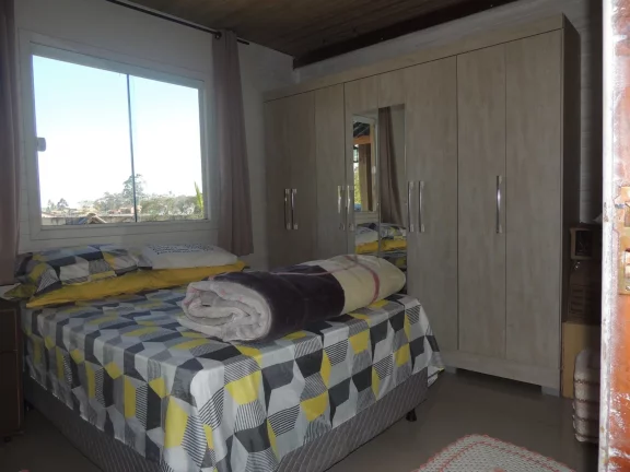 Imagem Casa à venda em Imbituba-SC, Alto Arroio: 4 quartos, 1 suíte, piscina e 150m² - Imperdível!