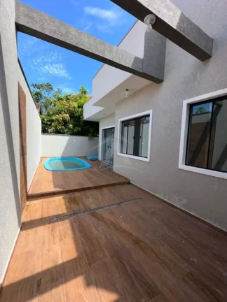 Imagem CASA COM PISCINA, 3 QUARTOS SENDO 1 SUÍTE, PONTAL