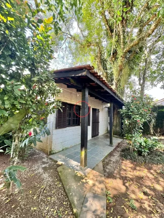 Imagem CASA CHARMOSA ;BOISSUCANGA,2 DORMITÓRIOS,SALA AMPLA,AVARANDADA,EDICULA COM QUARTO AMPLO E BANHEIRO, ARVORES FRUTIFERAS EM 581 MT2