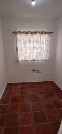 Imagem Sobrado com 4 dormitórios à venda, 180 m² por R$ 480.000,00 - Massaguaçu - Caraguatatuba/SP