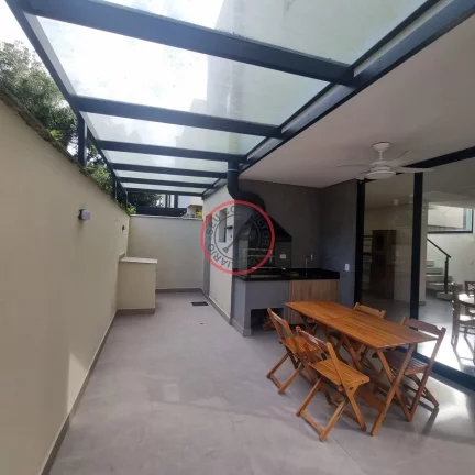 Imagem CASA DE ALTO PADRAO EM CONDOMINIO, COM 3 SUITES , AREA GOURMET PRIVATIVA , 3 VAGAS, BEM PROXIMO A PRAIA