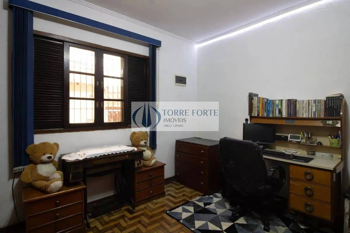 Imagem Casa com lindo espaçoso quintal, 3 vagas de garagem, 2 dormitórios