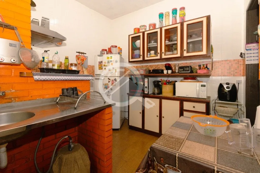 Imagem Casa 2 pavimentos com 130m² de área privativa, três dormitórios, living dois ambientes, sala de ...