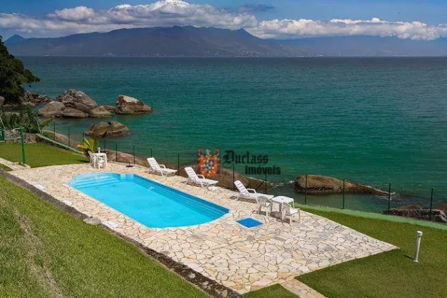 Foto do imóvel Flat com 1 suíte à venda, 67 m² por R$ 600.000 - Martim de Sá - Caraguatatuba/SP