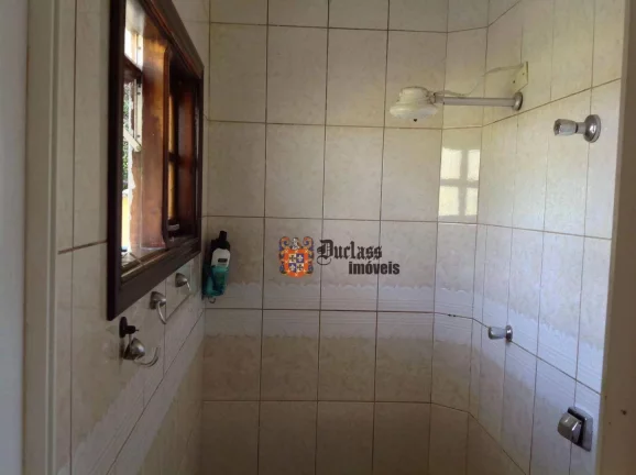Imagem Sobrado com 2 dormitórios à venda, 180 m² por R$ 590.000,00 - Balneario Praia do Perequê - Guarujá/SP