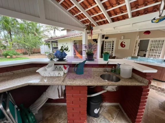 Imagem Casa à Venda no Condomínio Residencial Park Lane – 3 Suítes e Jardim com Árvores Frutíferas