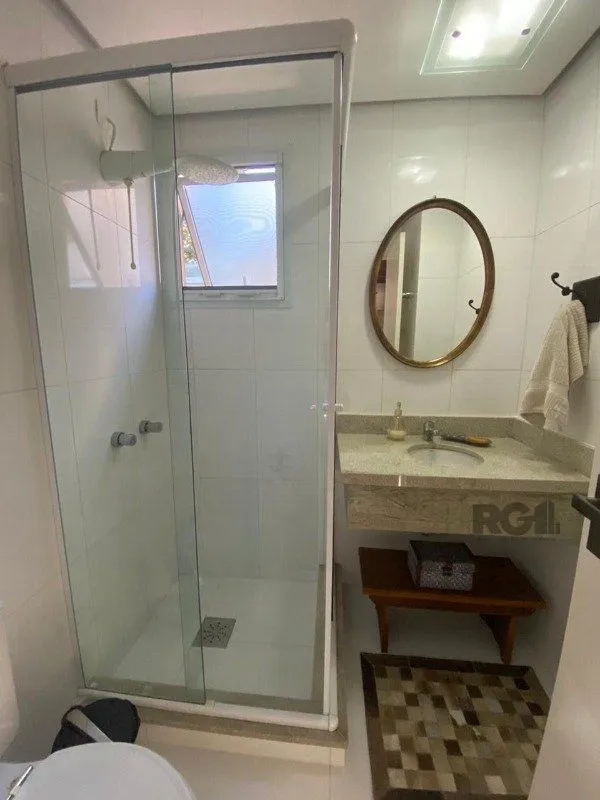 Imagem Casa em Condomínio para Comprar no bairro Pedra Redonda com 4 suítes