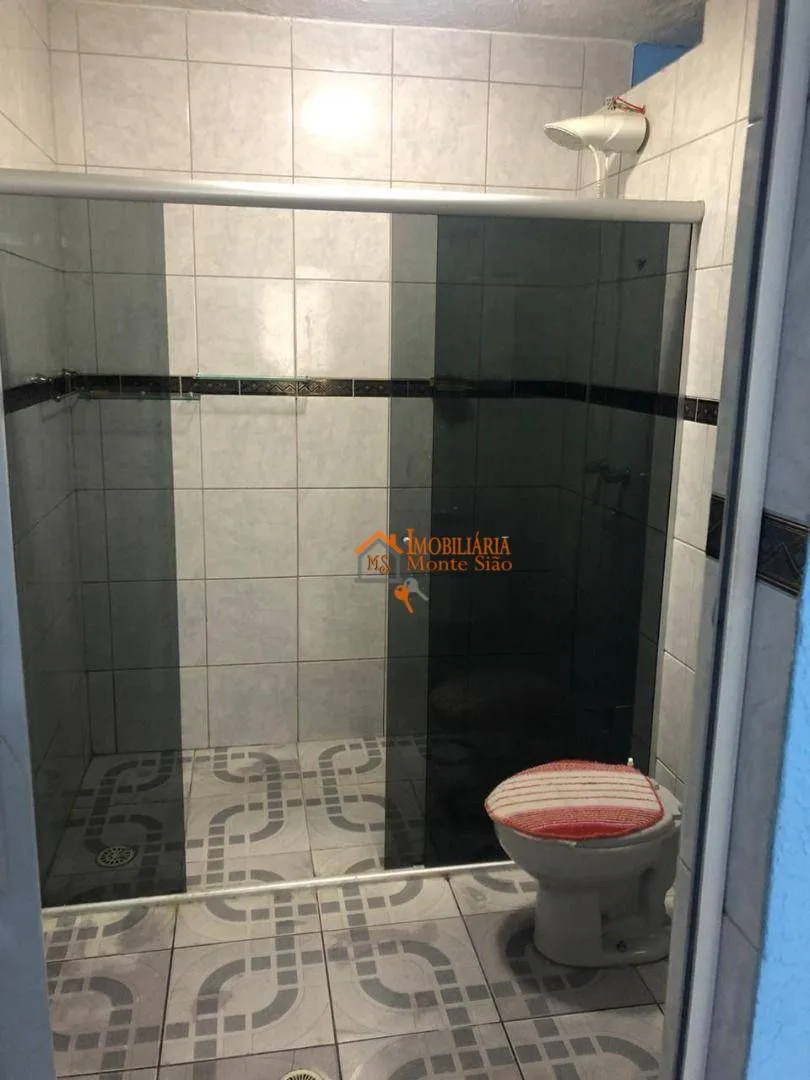 Imagem Casa com 3 dormitórios à venda, 377 m² por R$ 693.000,00 - Taboão - Guarulhos/SP