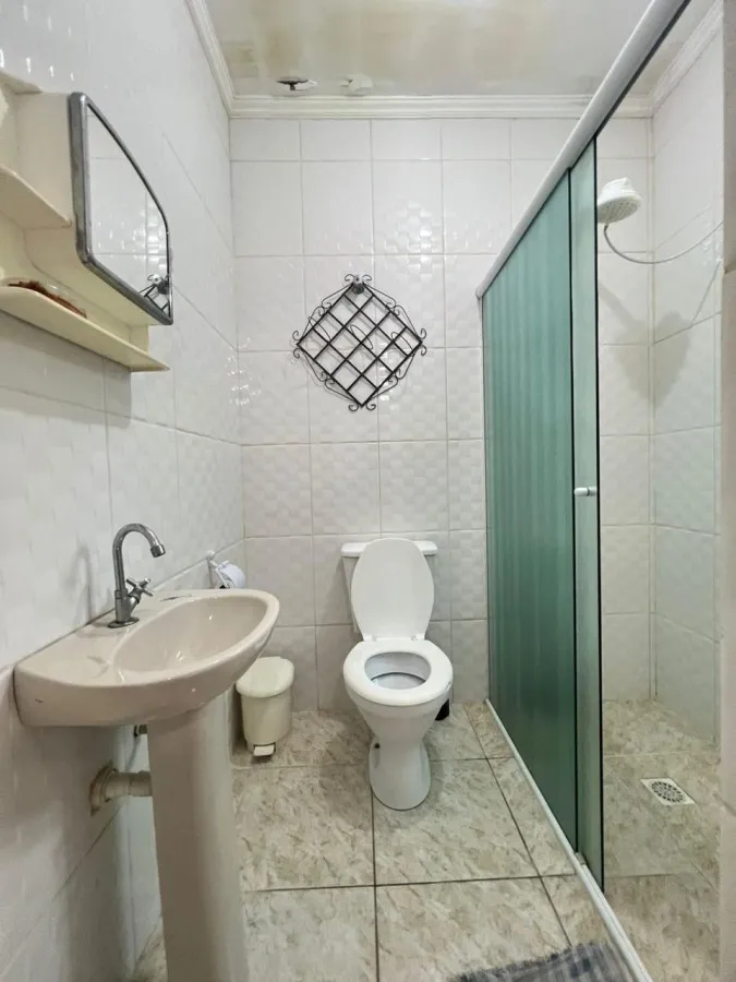 Imagem Casa para Venda em Praia Grande, Caiçara, 2 dormitórios, 1 suíte, 1 banheiro, 2 vagas