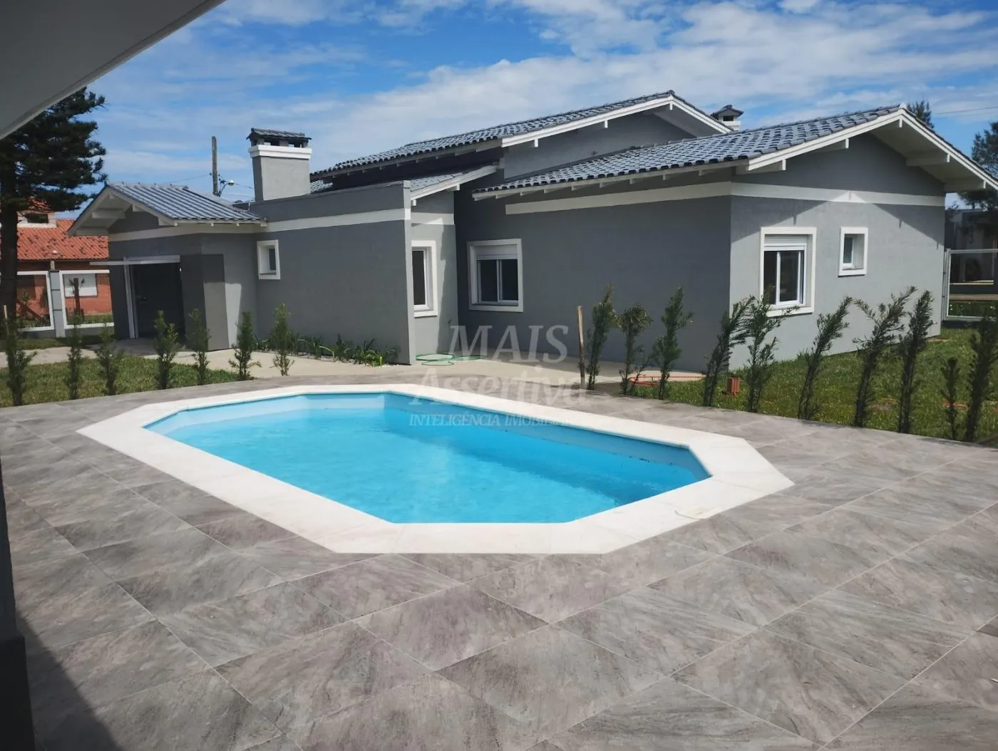 Imagem Excelente casa a venda em Tramandaí - 3 dormitórios, 2 vagas de garagem