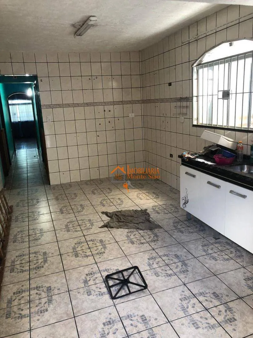 Imagem Casa com 3 dormitórios à venda, 377 m² por R$ 693.000,00 - Taboão - Guarulhos/SP