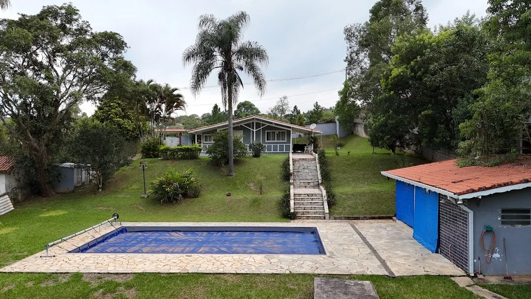Imagem Belíssima Casa no Condomínio Porta do Sol com piscina e casa de hóspedes