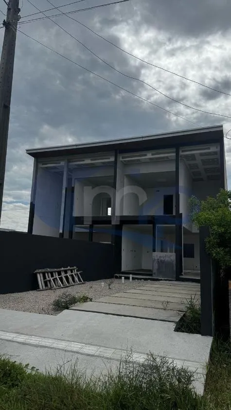 Imagem Sobrado Geminado á venda com 2 suítes no centro de Passo de Torres/SC