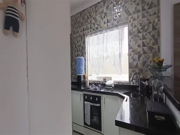 Imagem Casa com 2 dormitórios à venda, 63 m² por R$ 410.000,00 - Mirim - Praia Grande/SP