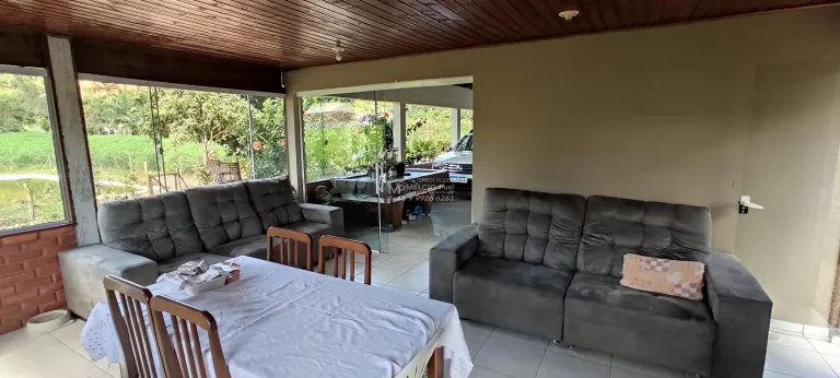 Imagem Sítio a venda, Com casa e lagoa de peixes, e riacho atravessado o terreno a 300 metros da SC 108. Boa área de 4.000m² de plantio com terra boa,