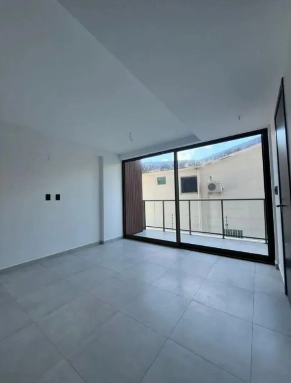 Imagem Flat novo em Camboinha, a 1 rua do mar, com rooftop e alto potencial para Airbnb. Ideal para investir ou morar.