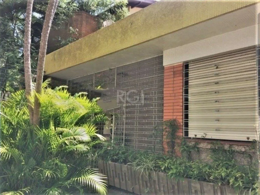 Imagem Casa de 3 dormitórios 4 vagas amplo terreno - Menino Deus