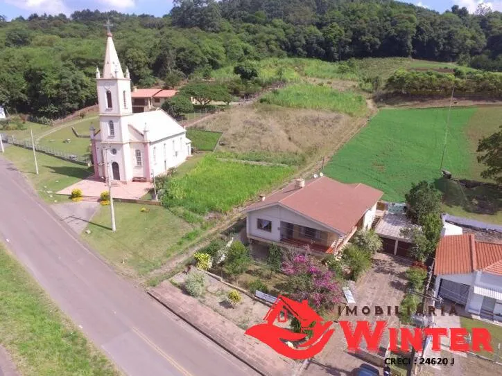Imagem Casa de 4 dorm com 2 box ao lado da igreja de Arroio Feliz.