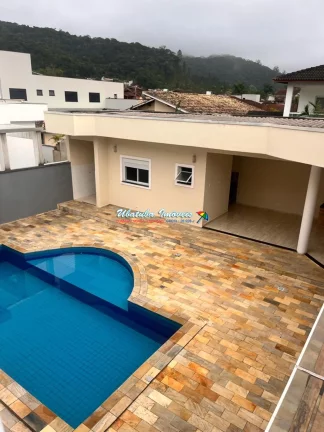 Imagem Linda casa em condomínio fechado com 04 suítes com lazer completo