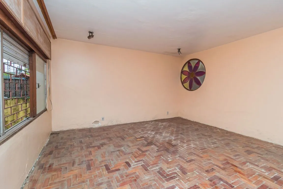 Imagem Casa de 4 dormitorios à venda Avenida Tramandaí, Ipanema - Porto Alegre