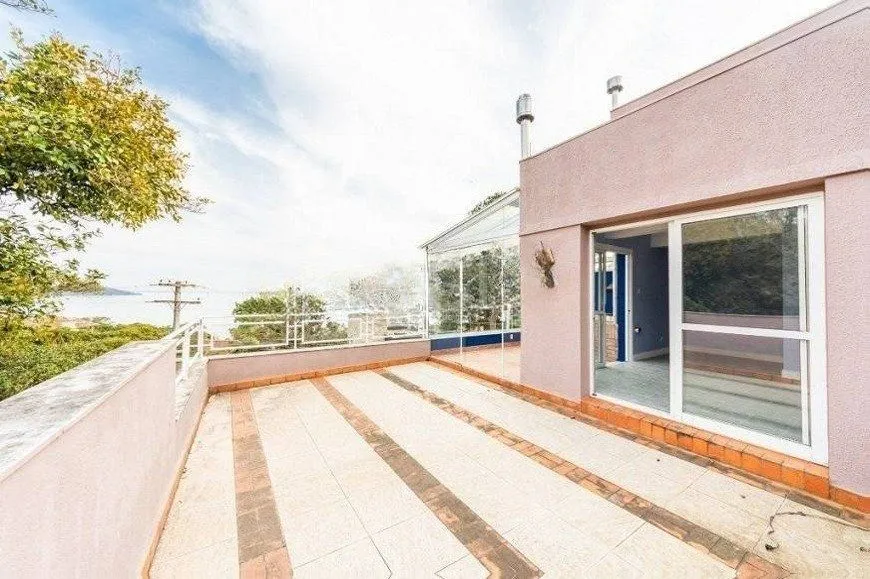 Imagem Casa à venda com 2 quartos, 255m² Rua CORONEL GOMES DE CARVALHO, Sétimo Céu, Porto Alegre