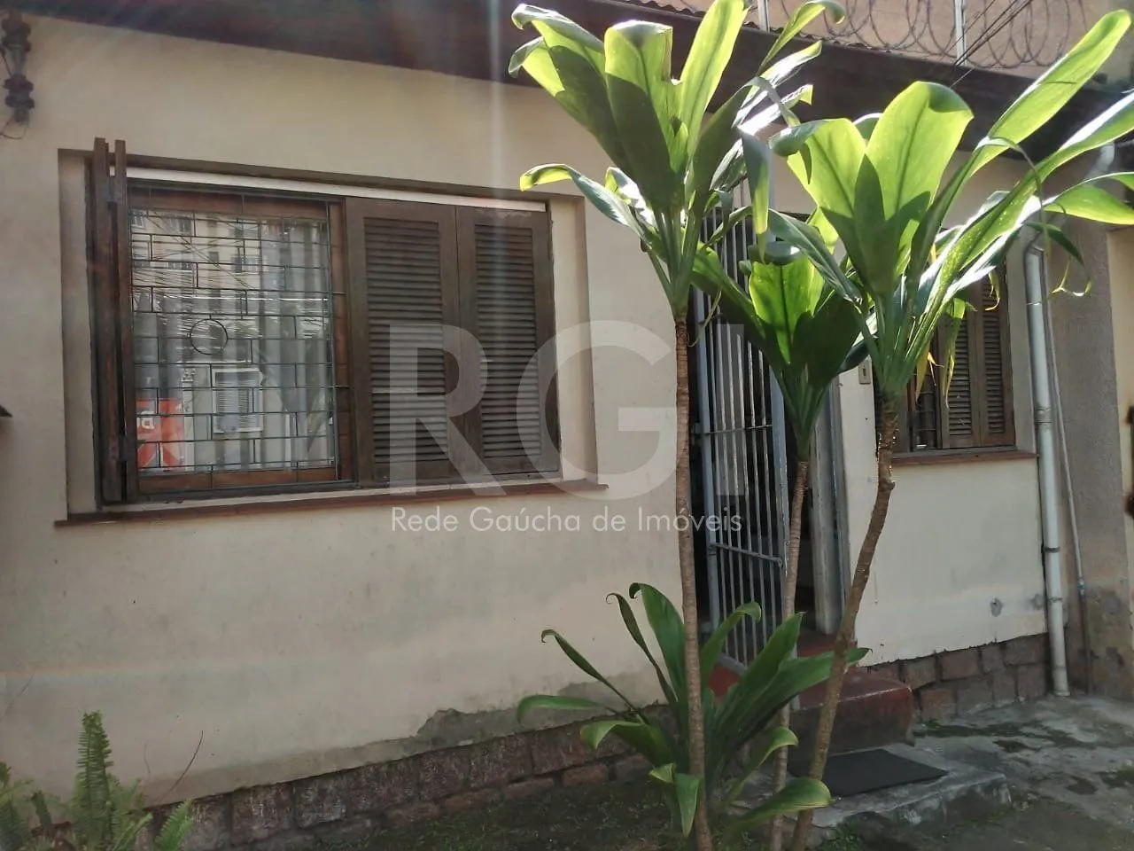 Imagem Casa para Venda - 130m², 2 dormitórios, 1 vaga - Cidade Baixa