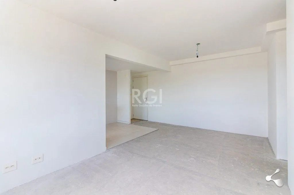 Imagem Vende apartamento, 03 dormitórios, living para dois ambientes, banheiro social, cozinha com churrasqueira e área de serviço e garagem.