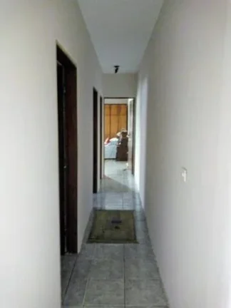 Imagem Sobrado com 235 metros de Construção 3 Dormitórios 2 Vagas de Garagens