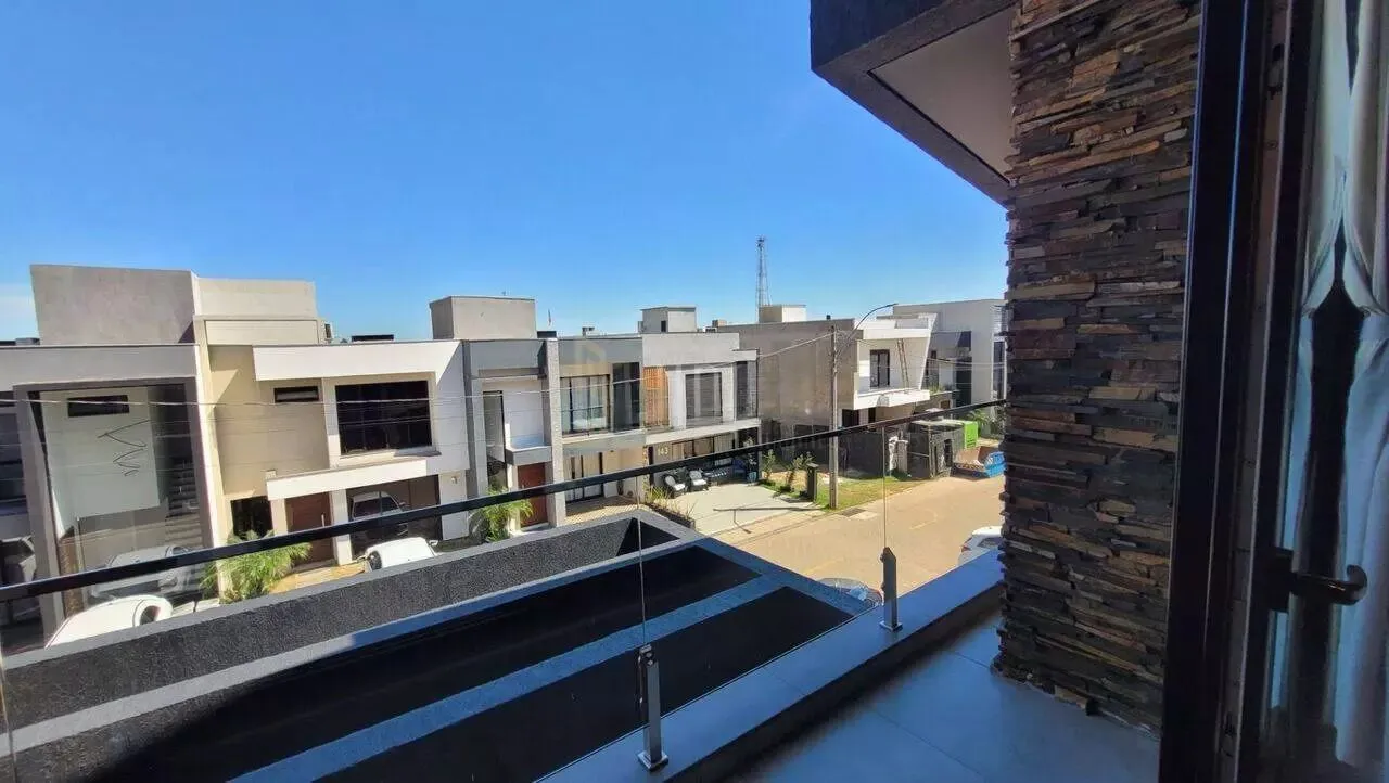 Imagem Casa em condomínio com 3 dormitórios, suíte e 2 vagas.