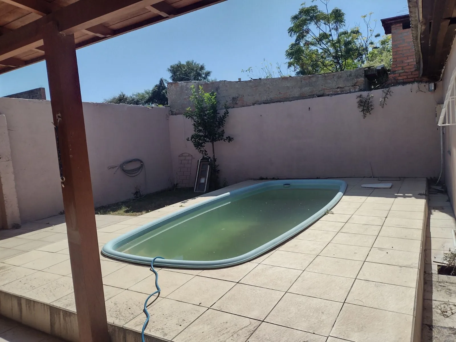 Imagem Casa de alvenaria com pátio, piscina Igui e churrasqueira no Parque dos Eucaliptos em Gravataí/RS