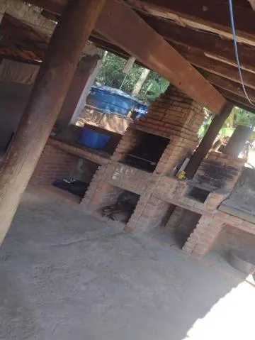 Imagem VENDA DE CASA NO TUPÃ ARUJÁ/SP, com 370m² sendo 2 casas, 03 dormitórios, sala, 02 cozinhas, 02 banheiros, área de lazer c/ churrasqueira. CONSULTE-NOS