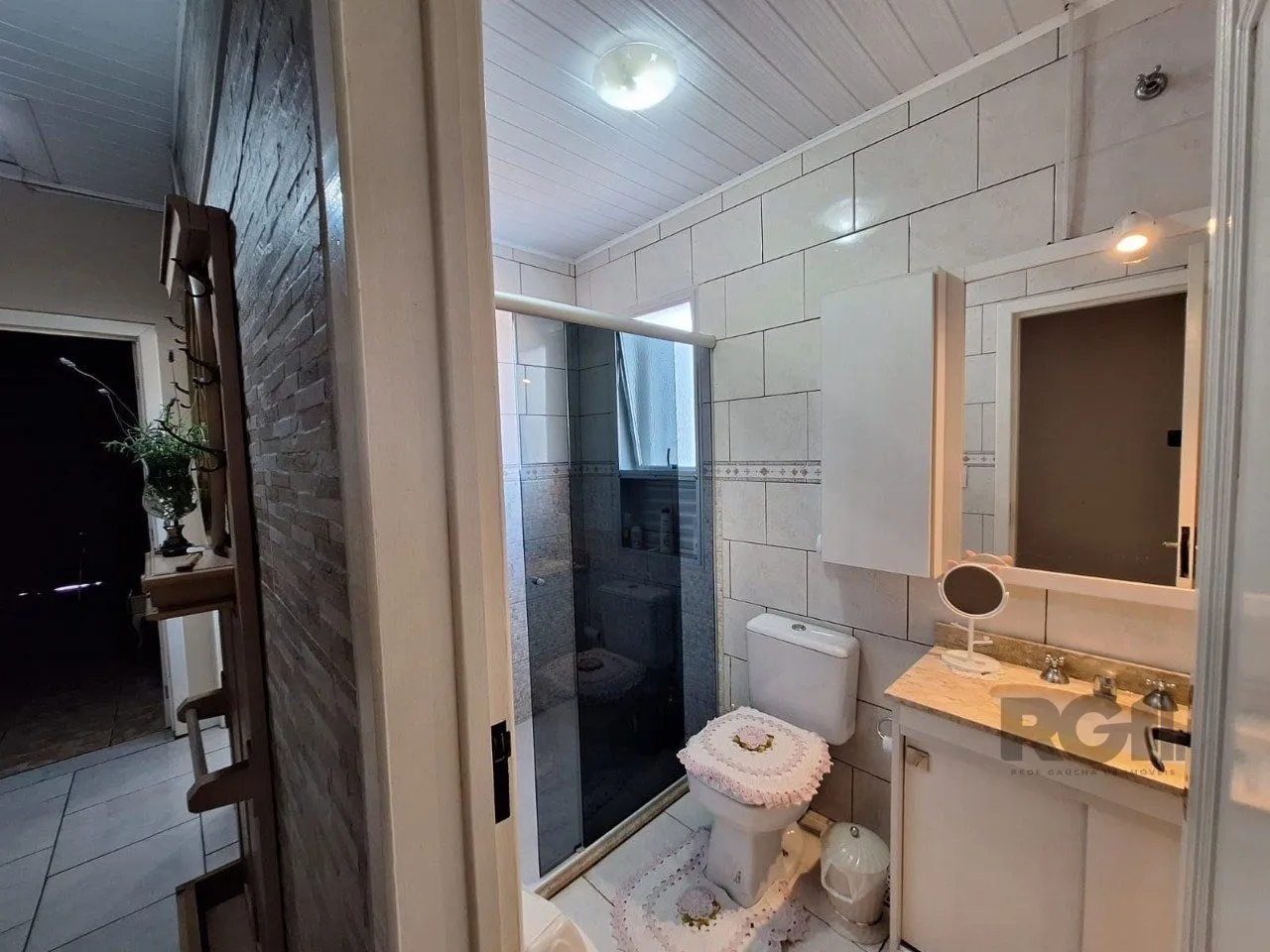 Imagem Casa com 3 dormitórios, suíte, lareira, Jardim Algarve em Alvorada - RS.