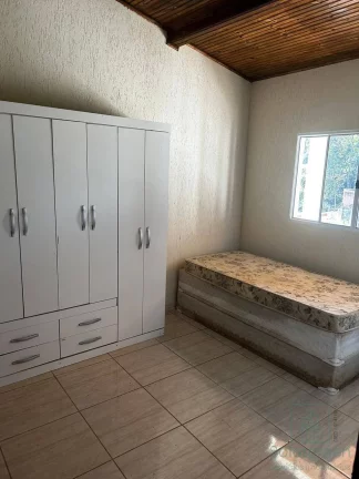 Imagem A venda propriedade com 1.400 m² de terreno e 3 imóveis - 890 mil