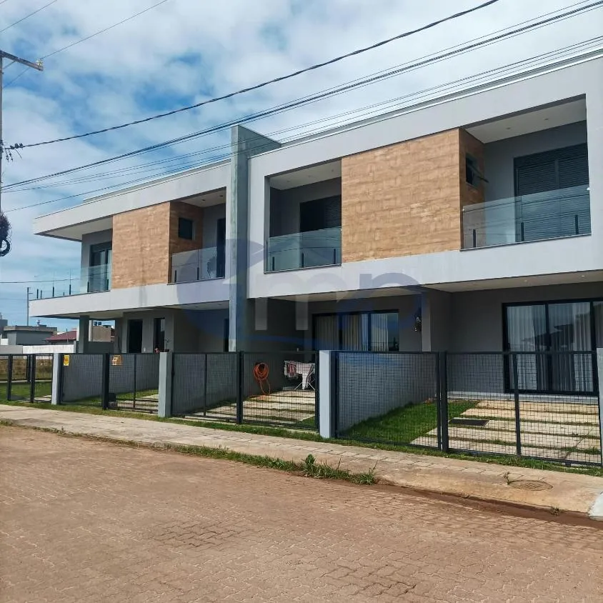 Imagem Sobrado semimobiliado de 2 suites a venda no Morada das Palmeiras, em Torres/RS