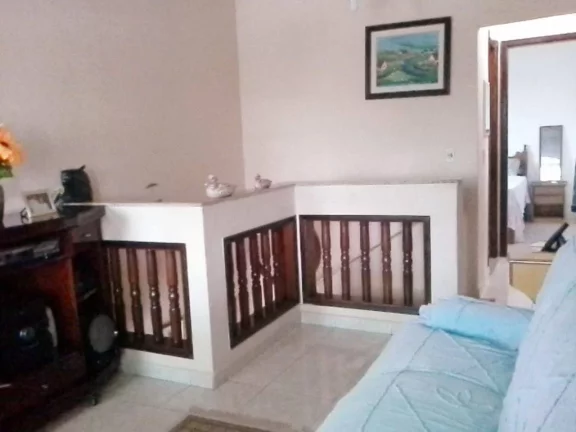 Imagem Sobrado com 4 dormitórios à venda, 216 m² por R$ 750.000,00 - Caiçara - Praia Grande/SP