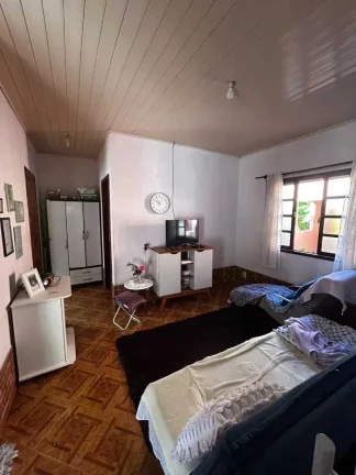 Imagem Terreno com 566,50 m² e casa no Centro de Porto Belo