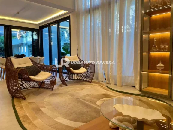 Imagem Casa de alto padrão na Riviera com design refinado e piscina com spa