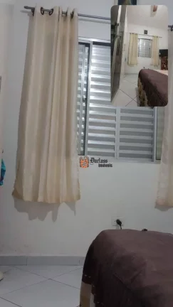 Imagem Casa com 2 dormitórios à venda, 64 m² por R$ 390.000 - Vila Caiçara - Praia Grande/SP