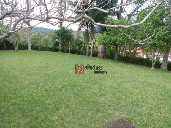 Imagem Casa com 2 dormitórios à venda, 113 m² por R$ 650.000 - Massaguaçu - Caraguatatuba/SP