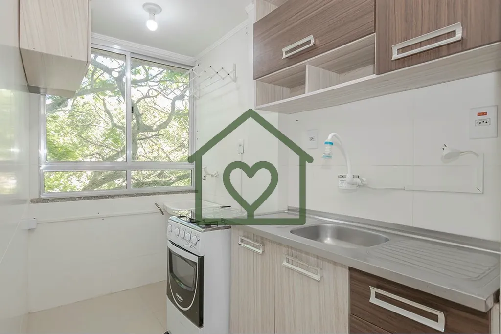 Imagem Descubra o seu novo lar em Porto Alegre, RS! Este charmoso apartamento localizado na Av. Princesa Is...