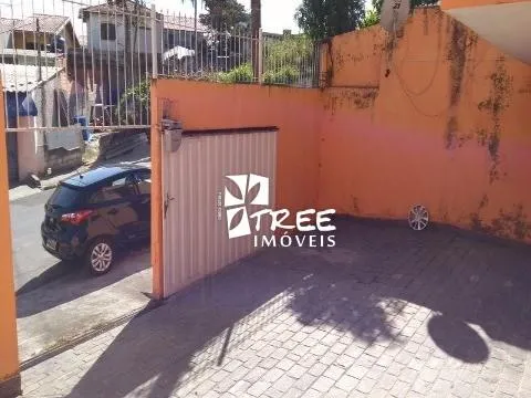 Imagem VENDA DE SOBRADO NO ARUJAMÉRICA, EM ARUJÁ/SP, 320m² com 3 quartos, suíte, lavanderia, salão e 05 vagas, sendo 02 cobertas. CONSULTE-NOS.