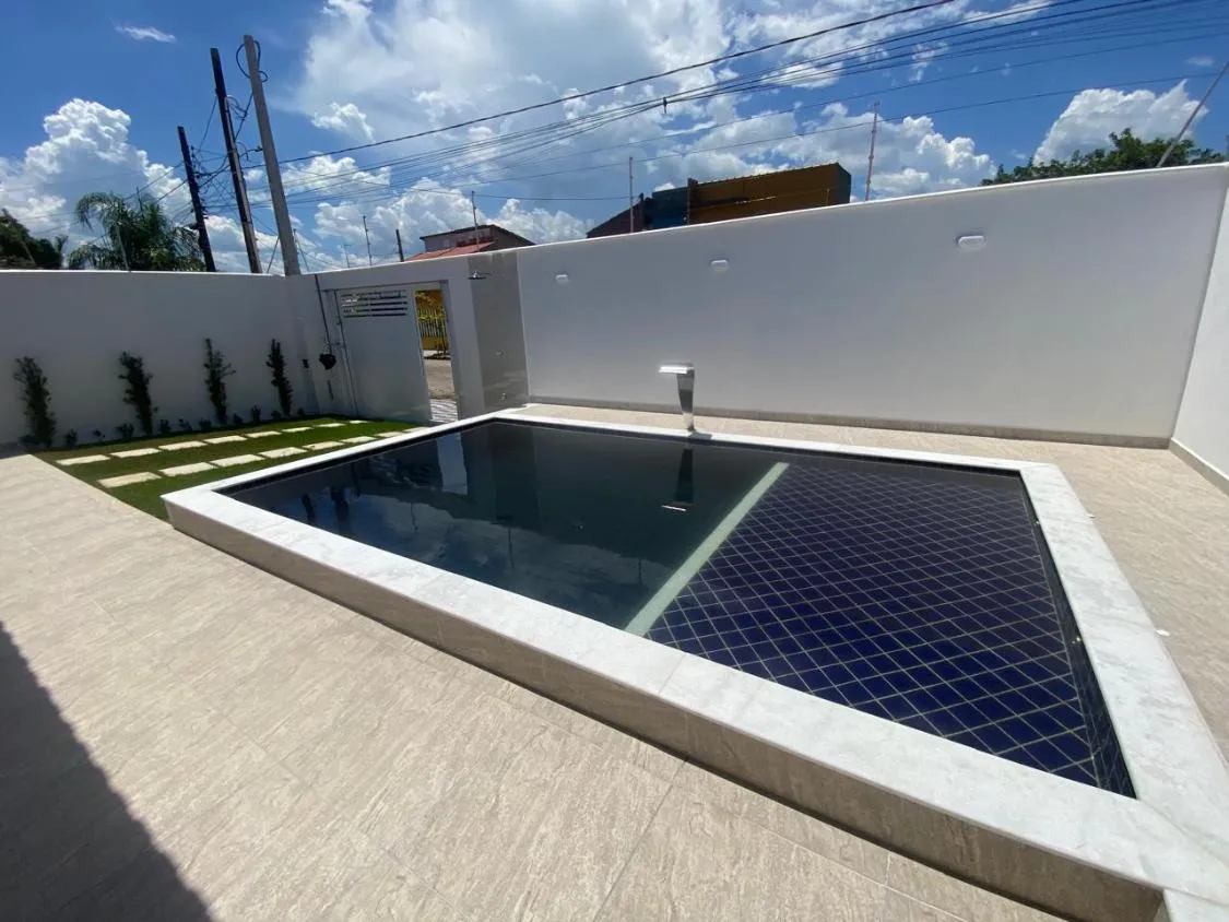 Imagem LINDA CASA NOVA COM PISCINA A 520 METROS DO MAR NO BOPIRANGA