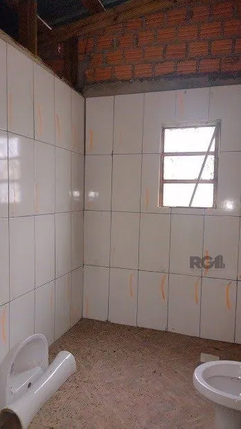 Imagem Casa de dois dormitórios localizada no Bairro Nonoai
