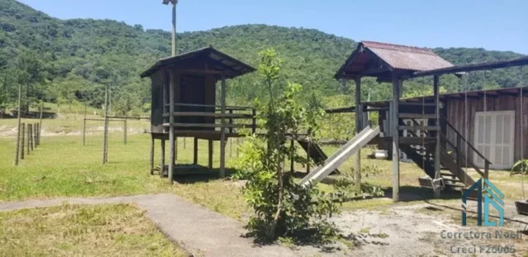 Imagem Sítio plana, 24.200 mil m², lagoa c/ peixes, área gourmet, fibra ótica, em ITAJAÍ SC