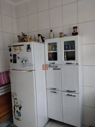 Imagem Sobrado com 2 dormitórios à venda, 75 m² por R$ 450.000 - Rio da Praia - Bertioga/SP