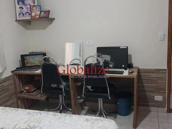 Imagem Casa térrea à venda com 125m², 2 quartos, churrasqueira, área coberta, vaga de garagem coberta por R$390.000,00 em Santos