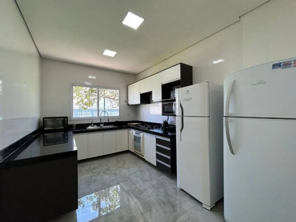 Imagem Alugar casa em condomínio em Jardim Acapulco Guarujá SP, casa á venda em Guarujá SP