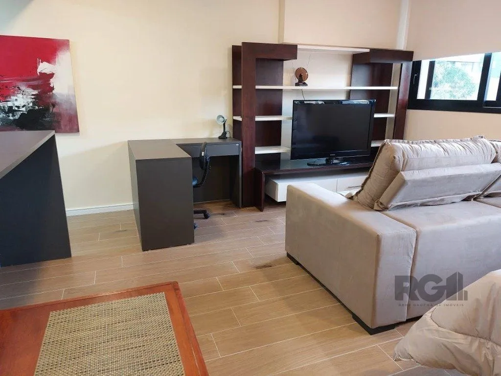 Imagem Apartamento stidio com 1 dormitório, 1 vaga de garagem no Bairro Auxiliadora.