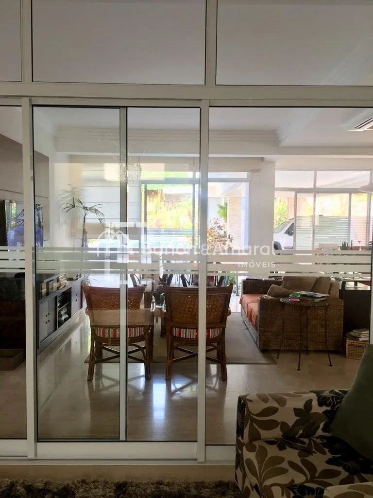 Imagem Casa de condomínio com 520 m² e 4 suítes